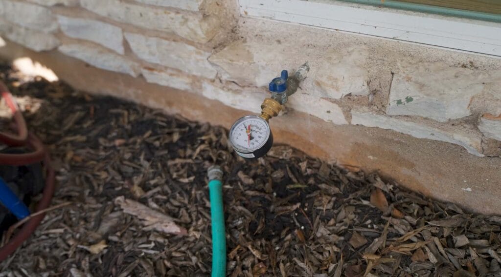 pressure gauge on a hose bib