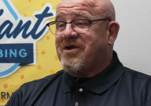 Toby Hamilton, Reliant Plumbing permit coordinator, discussing plumbing permit requirements