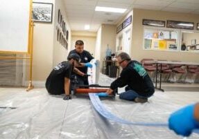 trenchless pipe repair - plumbers performing a sewer line replacement using trenchless sewer line replacement